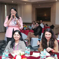 Sharing a laugh with attendees during an interactive segment. My ability to connect with people on a personal level helps in creating a warm and friendly event atmosphere.