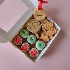 The 'Ho-Ho-Ho' Christmas box, featuring mini cupcakes, a Santa-themed pie, reindeer cookies, and a personalised 'Bobo' ornament.