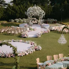 The overall wedding layout in Mussoorie, showing the relationship between the mandap, the guest seating, and the surrounding landscape. The design feels integrated with nature, creating a cohesive and immersive experience.