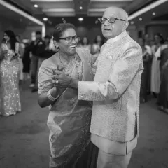 A black and white shot of the happy couple dancing at their 50th-anniversary party. The timeless quality of the photo matches their enduring love.