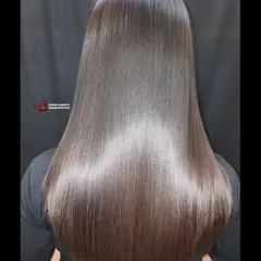 Dreaming of silky, straight hair? This permanent straightening treatment delivers glossy, smooth, and manageable locks, showcasing a dramatic hair transformation.