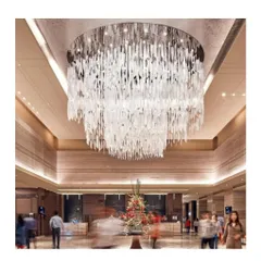 We believe lighting is sculpture. This large-scale, custom chandelier serves as the dramatic focal point in the lobby of the Sheraton Hotel, demonstrating our ability to design and execute grand, experiential hospitality spaces.