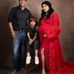 A picture-perfect family of three, soon to be four! Including older children in the maternity shoot makes them feel part of the special journey.