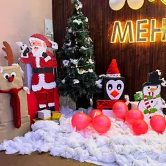 Christmas magic is in the air at Tansen Mehrauli! Our festive corner with a Christmas tree, Santa, and a snowman is all set to welcome the holiday season with joy and music.