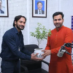 Presenting a Tulsi plant, which is sacred in Ayurveda for its healing properties, as a token of gratitude at the radio station. It was a pleasure to connect with the team.