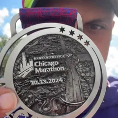 A close-up of the hard-earned Chicago Marathon medal. This represents months of consistent training, early mornings, and pushing through tough workouts. So proud to have been the coach behind this finish.