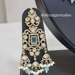 Unique caption for media id 3 describing the specific jewellery and look.