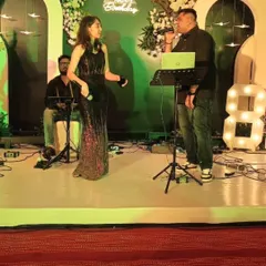 Our male and female vocal duo performing a duet on stage. Having both singers allows us to cover a wide range of Bollywood and popular songs, adding variety and energy to the performance.