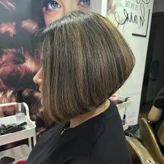 A side profile of the corrected inverted bob, now with a flattering angle and clean lines.