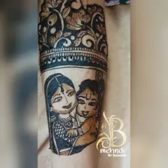 A close-up of a sweet baby shower design element. This portrait shows mother Yashoda with baby Krishna, a classic and beloved theme for celebrating motherhood.