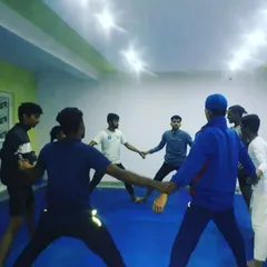 A look at our daily stretching routine from another angle. Consistent practice like this is key to developing the physical attributes of a serious karateka.