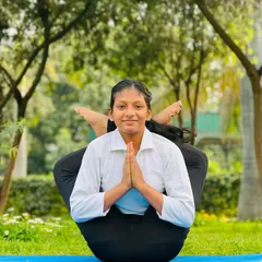 Balance is something you create. This young student finds her center in this beautiful and complex seated balancing pose.