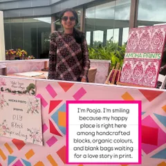 (Image) This is my happy place: surrounded by handcrafted blocks and ready to help guests create a love story in print. I customize every setup to match the vibe of your special day.