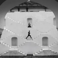 The ancient stepwells of Jaipur provided a stunning, graphic backdrop for this pre-wedding portrait. I love using architectural elements to create dramatic and timeless images that feel like fine art.