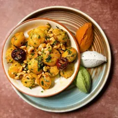 Another view of our Independence Day special, showcasing the vibrant saffron, white, and green chutneys alongside our classic gunpowder idlis.
