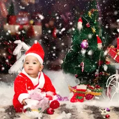 Celebrate the holidays with a festive Christmas themed photoshoot. This setup includes a snowy backdrop, a Christmas tree, and a cute Santa costume for your baby.