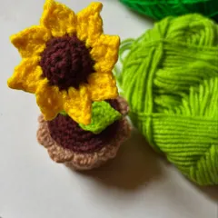 Say it with sunshine! This handmade crochet sunflower pot is the perfect everlasting gift for someone special.