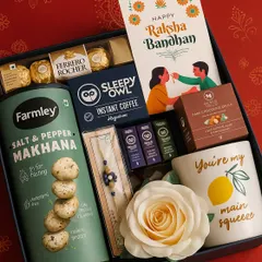 Make your brother feel special with this packed Rakhi hamper. It features a "You're my main squeeze" coffee mug, Sleepy Owl coffee, Farmley makhana, Ferrero Rocher, and a moisturizer from The Man Company.