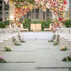 We love to create signature "wow" moments that your guests will talk about for years. This upside down garden, with thousands of flowers suspended overhead, transformed a simple ceiling into an enchanted floral sky for the wedding ceremony.