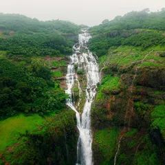 An 'Edit With Me' post, showing the before and after of this shot of the Necklace Waterfall in Bhandardara. I walk you through my Lightroom process to bring out the lush greens and powerful water flow.