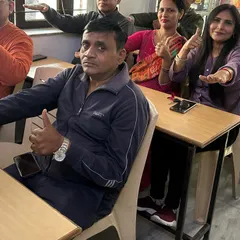 Parents participating in an interactive exercise during our workshop. These sessions are designed to be full of enthusiasm, learning, and commitment to their child's growth.