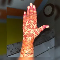 The beautiful result of using natural, chemical-free henna. This is the kind of deep red stain you can expect from my work.