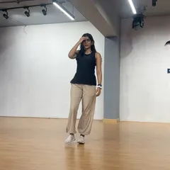 Caught in a moment of flow during a practice session. This is what it looks like to be completely lost in the movement, a core part of the expressive dance experience I share.