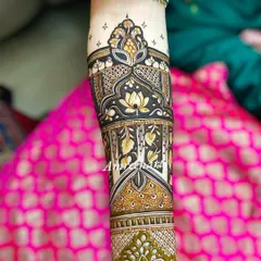 Another example of a 3D arm band, this one featuring intricate architectural details and leaf patterns.