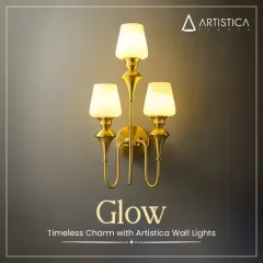 This elegant three-light wall sconce is a timeless classic. The candelabra-style arms and frosted glass shades provide ample, diffused light, making it an excellent choice for a living room, dining area, or a grand hallway.