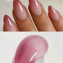 A stunning pink ombré on long, almond-shaped nails. The color fades from a soft, milky pink at the base to a vibrant, juicy pink at the tip.
