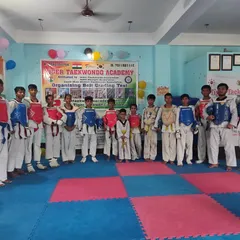 The team of Tiger Taekwondo Delhi, all geared up and ready for a sparring session.
