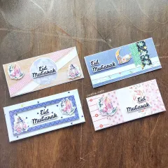 A variety of my handmade Eidi envelopes. I can customize them with different colors, patterns, and embellishments to match your style for the Eid celebration.