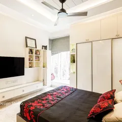 Another angle of the bedroom from image 13, showing the layout and balance of colors.