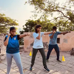 Students practicing their punching technique during our complimentary outdoor training camp. Learning in a group setting fosters a sense of community and shared purpose, making the experience both effective and enjoyable.