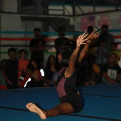 A moment of grace and flexibility during a floor routine. We help our students build the confidence to perform in front of an audience.