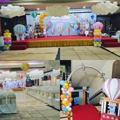The Hot Air Balloon theme is a whimsical choice for a baby shower. I design the entire experience, including the main stage, entrance decor, and balloon arrangements that fill the hall.