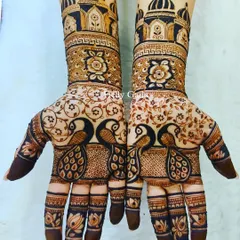 A peacock-themed design with a modern twist. The clean lines and floral patterns complement the majestic peacocks on the palms and arms.