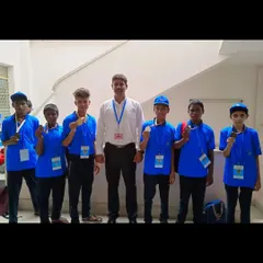 I am very proud to stand with my junior boxing team after their success at the Karnataka Mini Olympics. We train them for discipline and results, and their medals show the hard work we put in together.