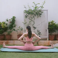 A side split, or Samakonasana, is an advanced posture that requires significant hip and inner thigh flexibility. My workshops focus on the preparatory stretches that build up to poses like this safely over time, always respecting your body's limits.
