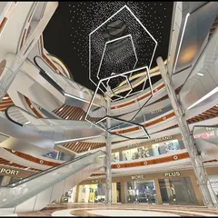 The interior atrium of LP Walk Mall, showcasing a dynamic, multi-level space with interconnected escalators. The design focuses on creating fluid circulation and visual excitement to enhance the shopping experience.