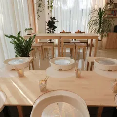 The heart of our studio, with pottery wheels set up and ready for a class. This is where our community of creators comes together to learn and make.