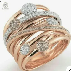 A close-up of an intricate, multi-band ring we redesigned. It features interwoven bands of rose and white gold, highlighted with lines of pavé diamonds and larger, clustered diamond settings for a truly dimensional look.