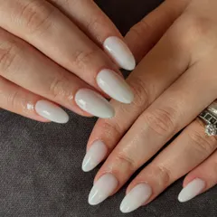 Another view of the elegant milky white nails. This color is a perfect modern alternative to a classic nude.