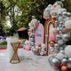 Another perspective of the outdoor naming ceremony setup, showing how the elements are arranged to create a beautiful and balanced focal point for the event.