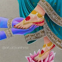 A beautiful depiction of Radha and Krishna's divine love, symbolized by their feet. This piece is rich with intricate details, from the alta on her feet to the delicate jewelry.