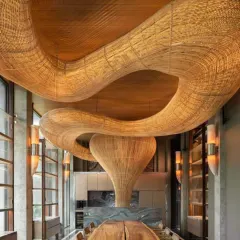 We create breathtaking, large-scale installations like this custom-woven ceiling feature, designed to be the centerpiece of any high-end commercial space. This piece demonstrates our ability to execute ambitious, artistic visions for architects and interior designers, transforming ordinary ceilings into works of art.