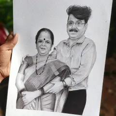 A heartfelt graphite portrait of a mother and son, drawn on A3 size paper. These portraits are a wonderful way to celebrate family bonds and make for a very personal and lasting gift.