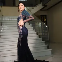 Another angle of this unforgettable look. The full-length view shows how the makeup and hair work in harmony with the dramatic silhouette of the dress. My goal is to create a cohesive, head-to-toe vision of glamour.