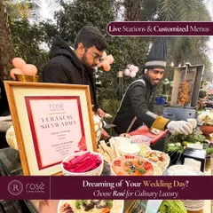 Our live Lebanese Shawarma station in action at an outdoor event. This offering is part of our comprehensive wedding package, which includes ten dynamic live stations and customized menus.