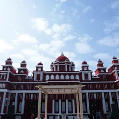 The palace facade structure seen during the day, showcasing the intricate architectural details we designed and built for this destination wedding.